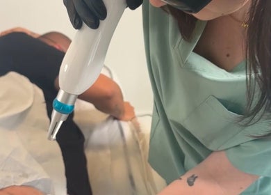 Therapist performing treatment at Nova Touch Clinic, Edgware, England, GB, enhancing client wellness.