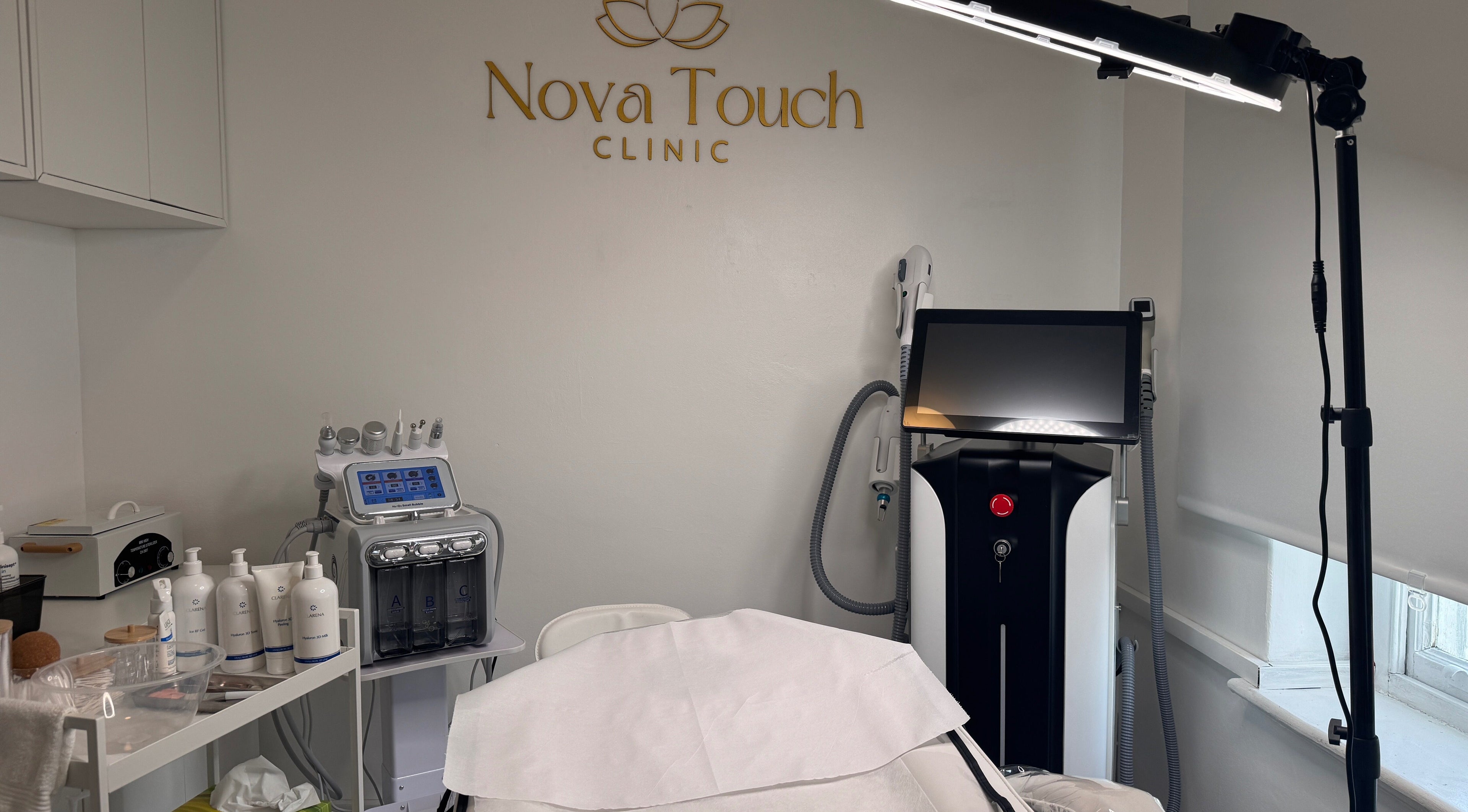 Nova Touch Clinic treatment room in Edgware, England, GB featuring advanced beauty equipment.