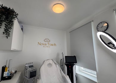 Treatment room at Nova Touch Clinic, Edgware, England, GB, showcasing modern equipment and soothing ambiance.