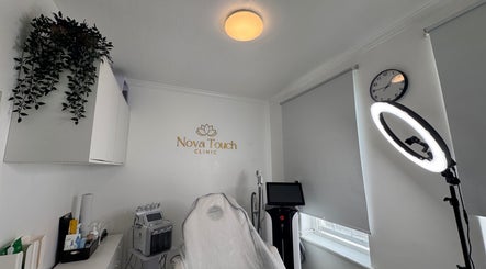 Treatment room at Nova Touch Clinic, Edgware, England, GB, showcasing modern equipment and soothing ambiance.