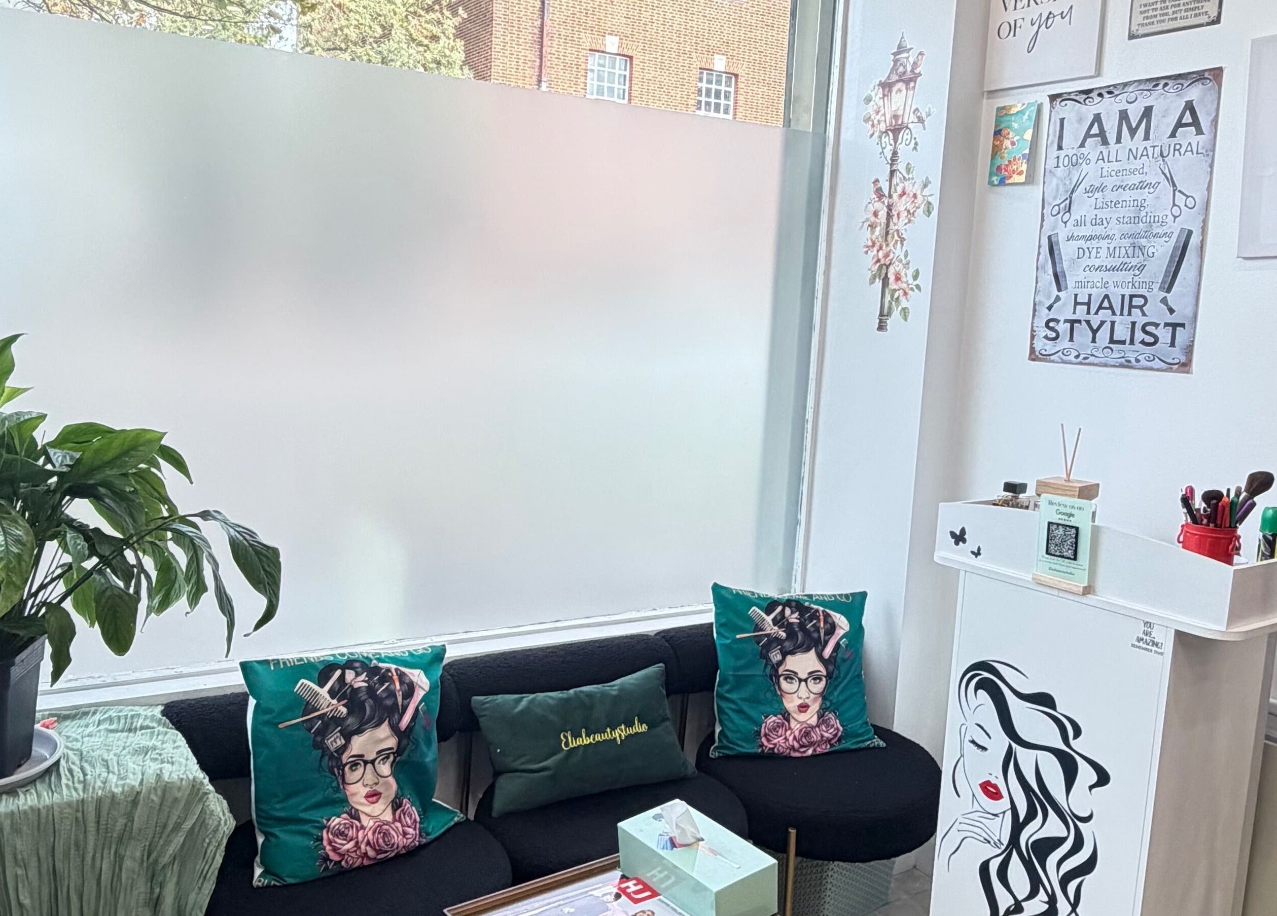 Stylish seating with green accents at Eliabeautystudio Ladies HairSalon, Wembley, England, GB.