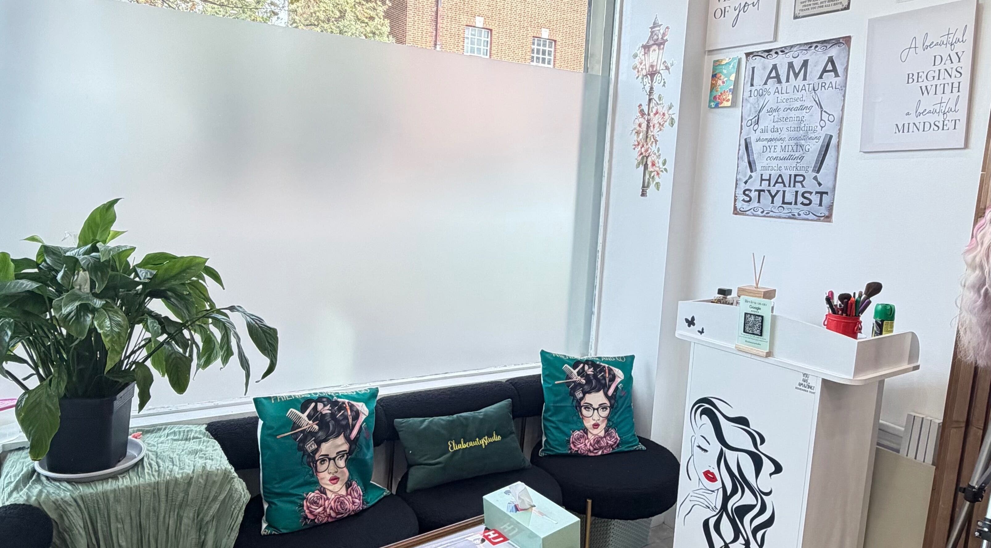 Stylish seating with green accents at Eliabeautystudio Ladies HairSalon, Wembley, England, GB.