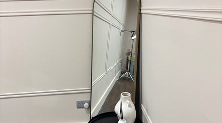 Stylish mirror and vase at hattieXhair, Worcester, England, GB.