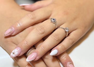 Exquisite nail art with rings at Kluxr Aesthetics, Birmingham, England, GB.