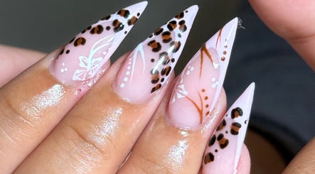 Stylish leopard print nail design at Kluxr Aesthetics, Birmingham, England, GB. Perfect for a chic look.