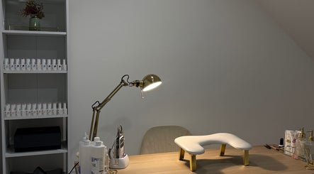 Kluxr Aesthetics nail care desk with tools in Birmingham, England, GB, spotlighted for precision.