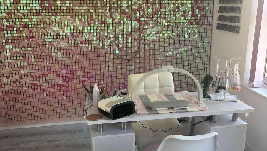 Nail station at TJ Nails & Beauty in Ripley, England, GB with chic decor and professional tools.