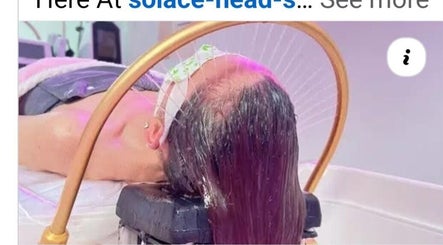 Relaxing head spa treatment at Solace Head Spa, Llandudno, Wales, GB, featuring soothing water flow.
