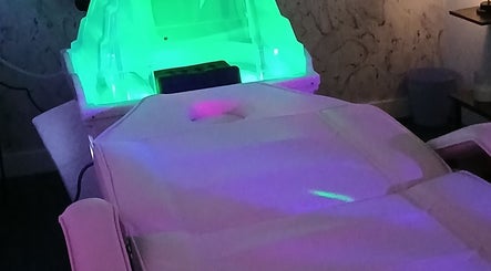 Relaxing spa room with glowing lights at Solace Head Spa, Llandudno, Wales, GB.