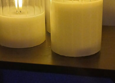 Relaxing candle ambiance at Solace Head Spa, Llandudno, Wales, GB enhances peaceful wellness experience.