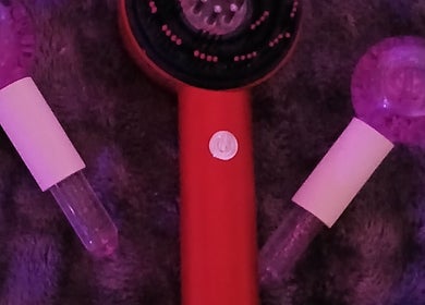 Therapeutic tools at Solace Head Spa, Llandudno, Wales, GB, enhance wellness with red and purple accents.