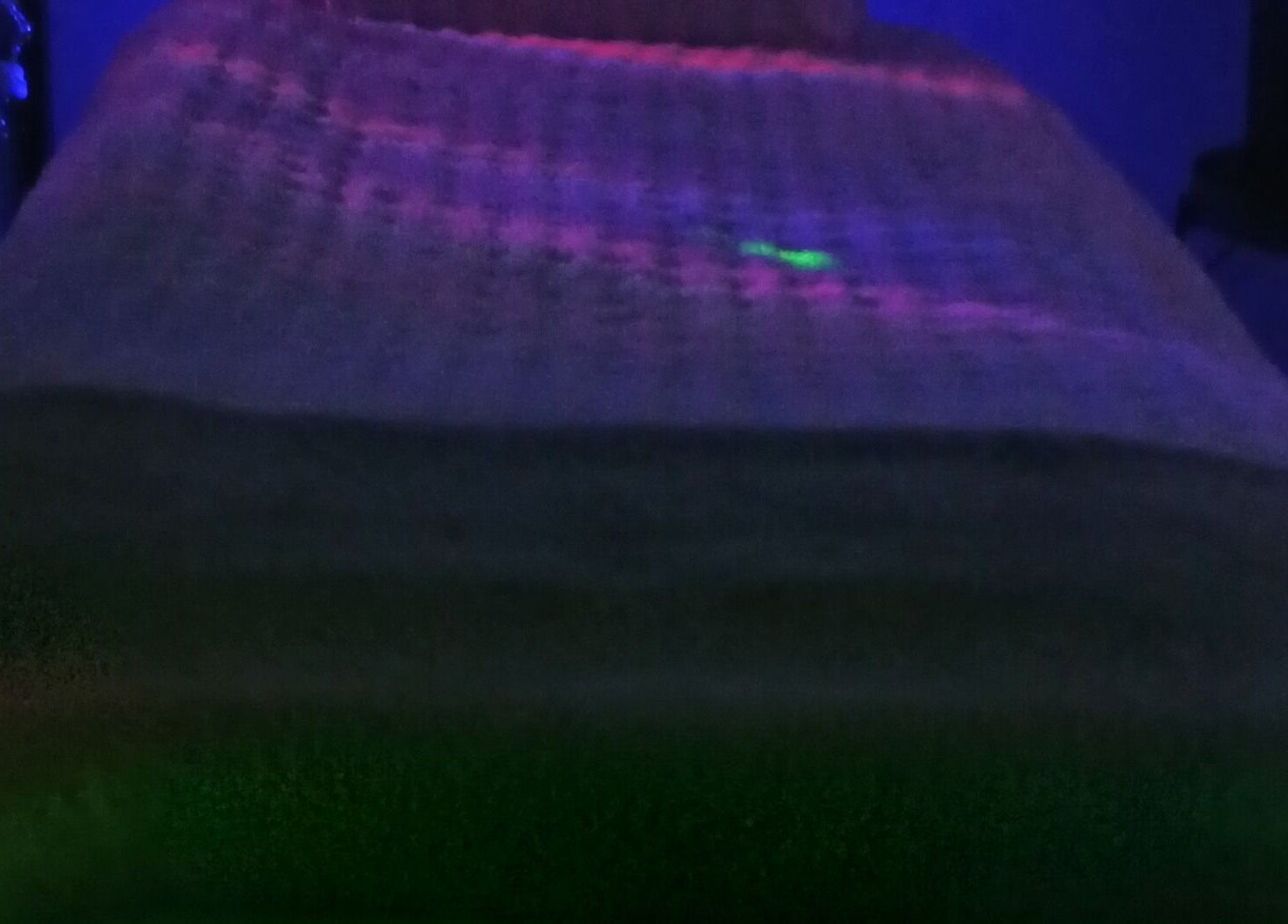 Relaxing spa bed at Solace Head Spa, Llandudno, Wales, GB under calming ambient lights.