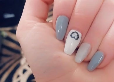 Elegant nail art design at Krystyn's Mobile Spa, Barrie, Ontario, CA, showcasing gray and white nails.