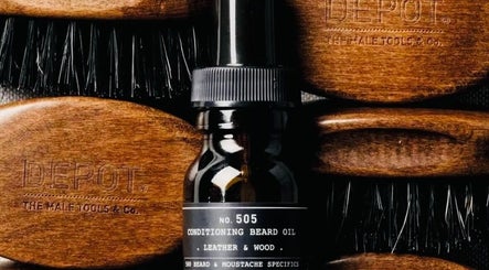 Conditioning beard oil and brushes at JOELS Barber Shop | Eastville, Toowoomba. Premium grooming in East Toowoomba, Queensland, AU.