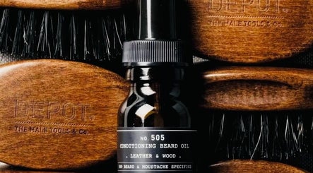 Beard oil and brushes at JOELS Barber Shop | Brisbane City, Queensland, AU for grooming excellence.
