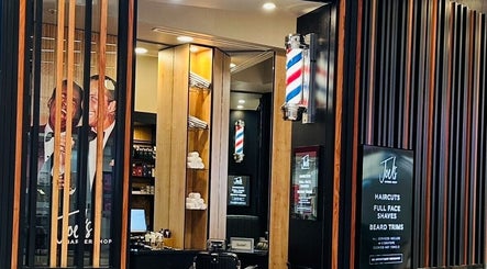 Inside look at JOELS Barber Shop | Brisbane City, showcasing modern decor in Brisbane City, Queensland, AU.