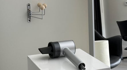 Modern hair dryer setup at HAUS OF BLONDE, Poway, California, US beauty salon.