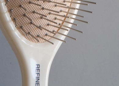 Refined hairbrush on display at HAUS OF BLONDE in Poway, California, US.