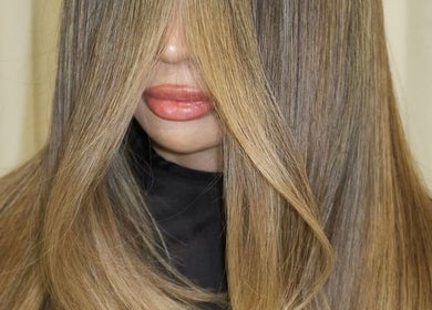Luxurious blonde hair styled at HAUS OF BLONDE, Poway, California, US.