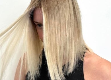 Stylish blonde haircut at HAUS OF BLONDE in Poway, California, US showcasing sleek, modern hair design.
