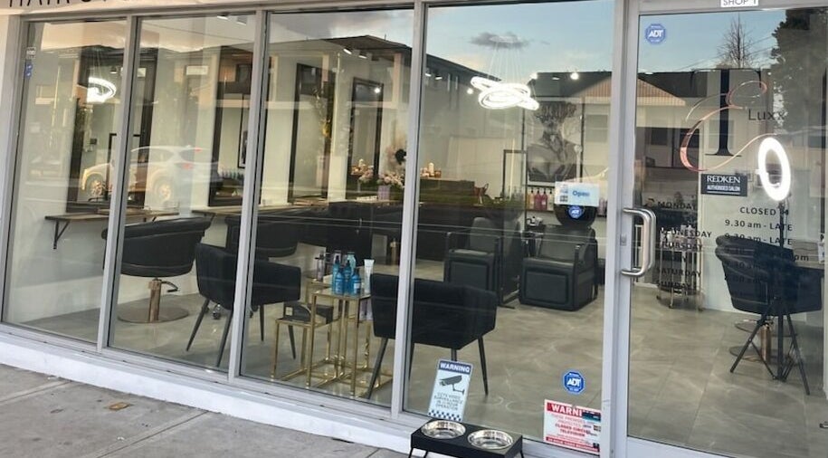 Exterior view of TE Luxx Hair Studio in Padstow, New South Wales, AU, showcasing sleek interior design.