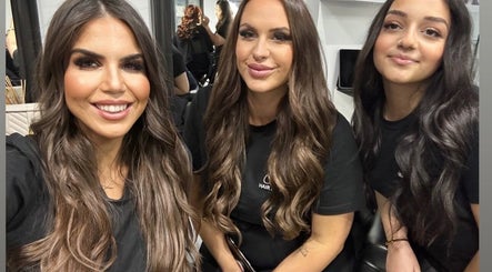Clients smiling at TE Luxx Hair Studio, Padstow, New South Wales, AU, showcasing elegant hairstyles.