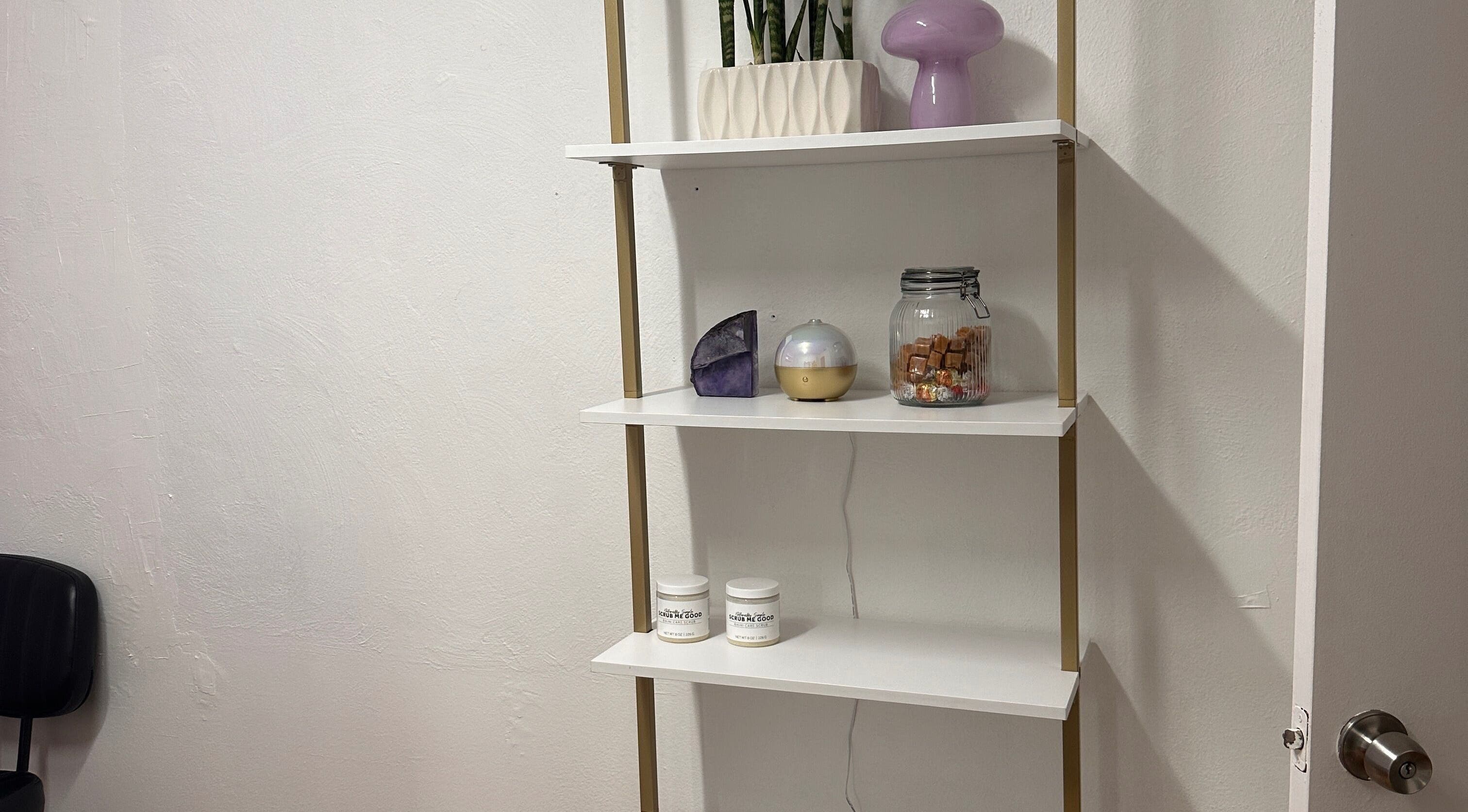 Chic shelves at Waxing by Ana Spadeto with decor, Pompano Beach, Florida, US.