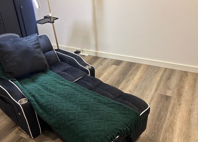 Comfortable relaxation chair at DĀNA X BEAUTY in Liverpool, New South Wales, AU, for premium wellness experience.