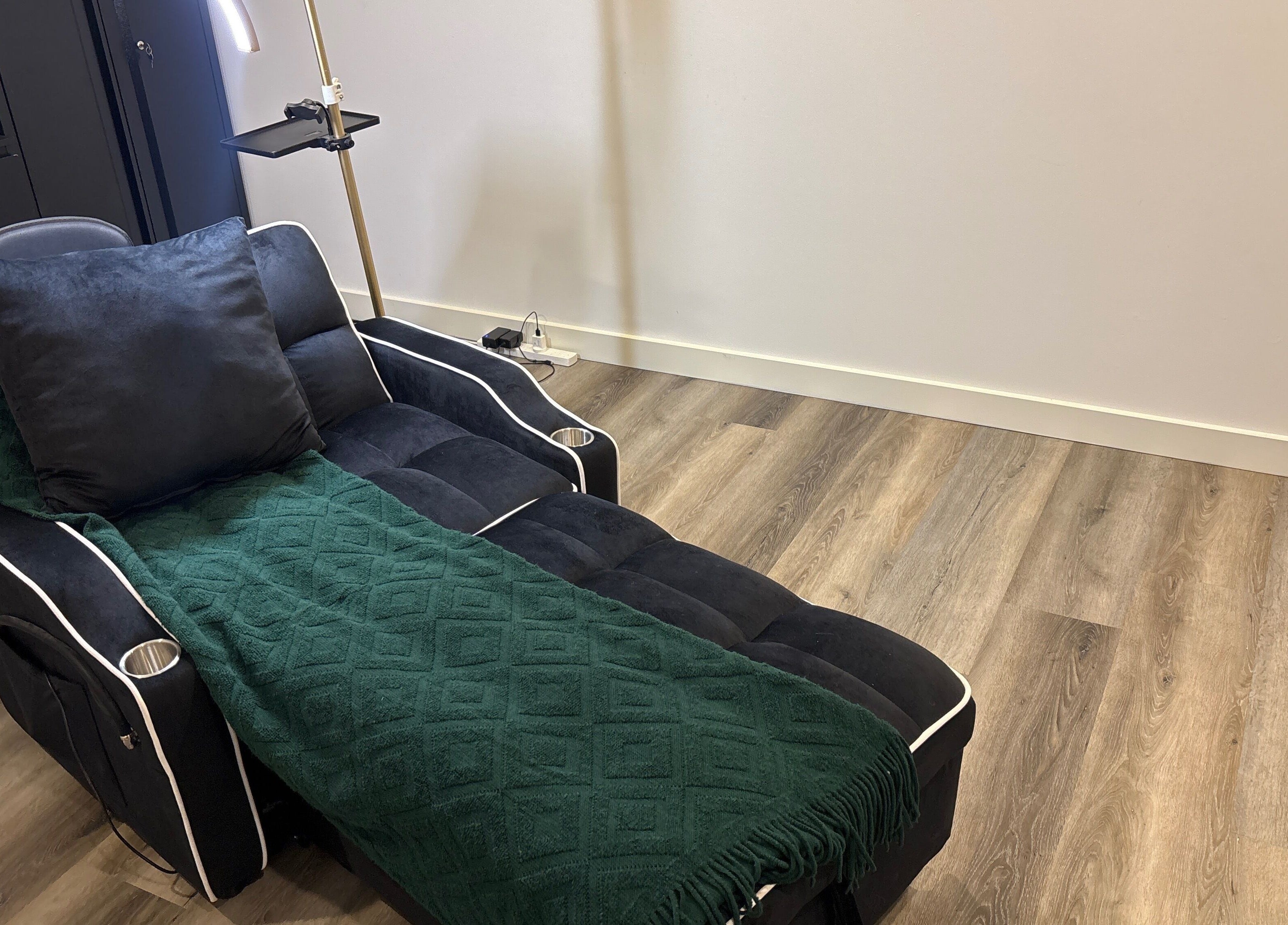 Comfortable relaxation chair at DĀNA X BEAUTY in Liverpool, New South Wales, AU, for premium wellness experience.