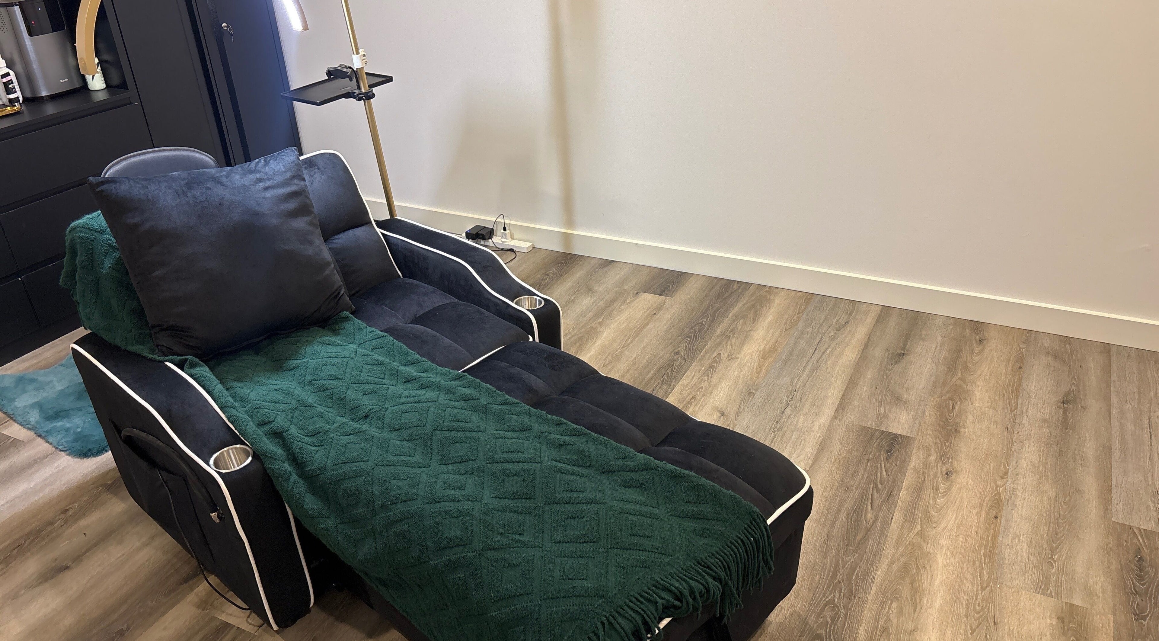 Comfortable relaxation chair at DĀNA X BEAUTY in Liverpool, New South Wales, AU, for premium wellness experience.