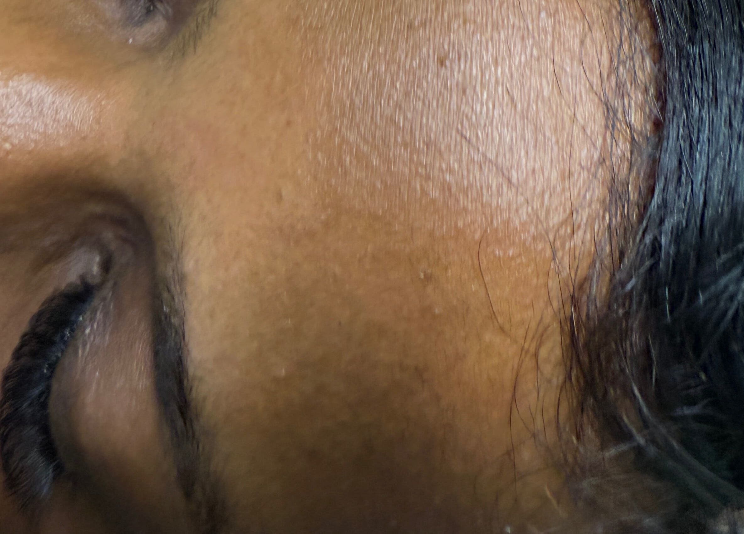 Close-up of a glowing complexion at PALM HOUSE ug, Mulawa, Central Region, UG.