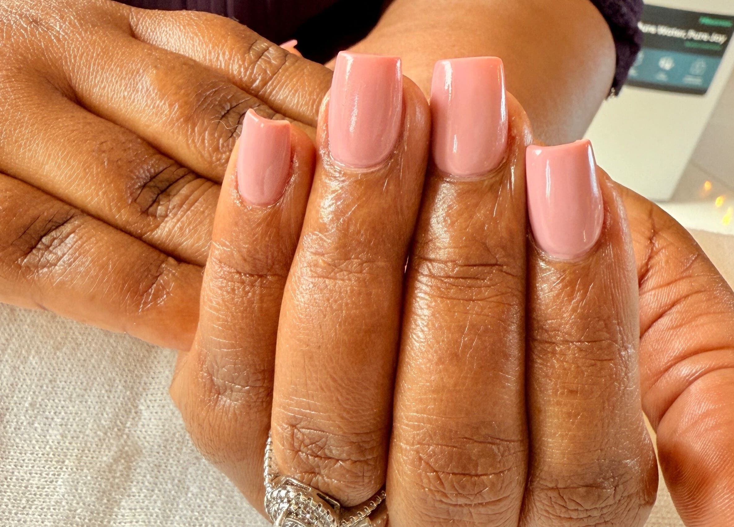Close-up of elegant pink manicure at PALM HOUSE ug, Mulawa, Central Region, UG.