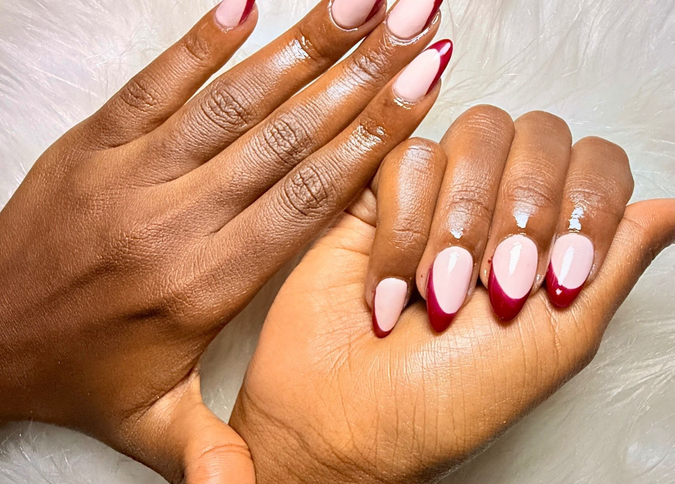 Stylish nail art at PALM HOUSE ug, Mulawa, Central Region, UG showcasing elegant red tips.