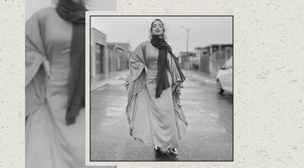Elegantly dressed woman in Cape Town street, showcasing style at The Mas Method, Western Cape, ZA.