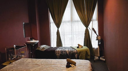 Serene treatment room at Yoyoy Kamphora Spa at Taman Melawati, Kuala Lumpur, ready for a peaceful experience.
