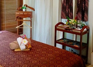 Relaxing massage room at Yoyoy Kamphora Spa Port Dickson, Negeri Sembilan, MY, with calming decor.