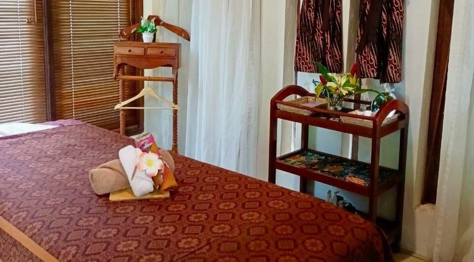 Relaxing massage room at Yoyoy Kamphora Spa Port Dickson, Negeri Sembilan, MY, with calming decor.