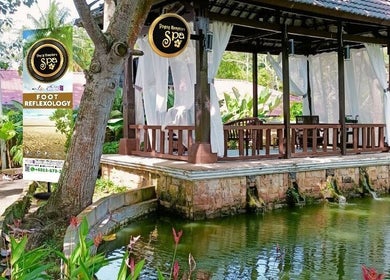 Charming outdoor pavilion at Yoyoy Kamphora Spa, Port Dickson, Negeri Sembilan, MY, surrounded by lush greenery.