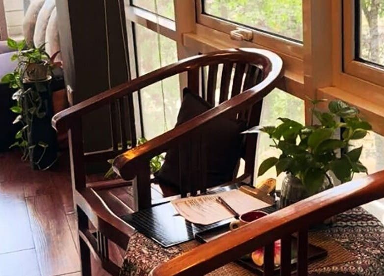 Relaxing seating area at Yoyoy Kamphora Spa Ayer at 8 Putrajaya with plants, Putrajaya, Wilayah Persekutuan Putrajaya, MY.