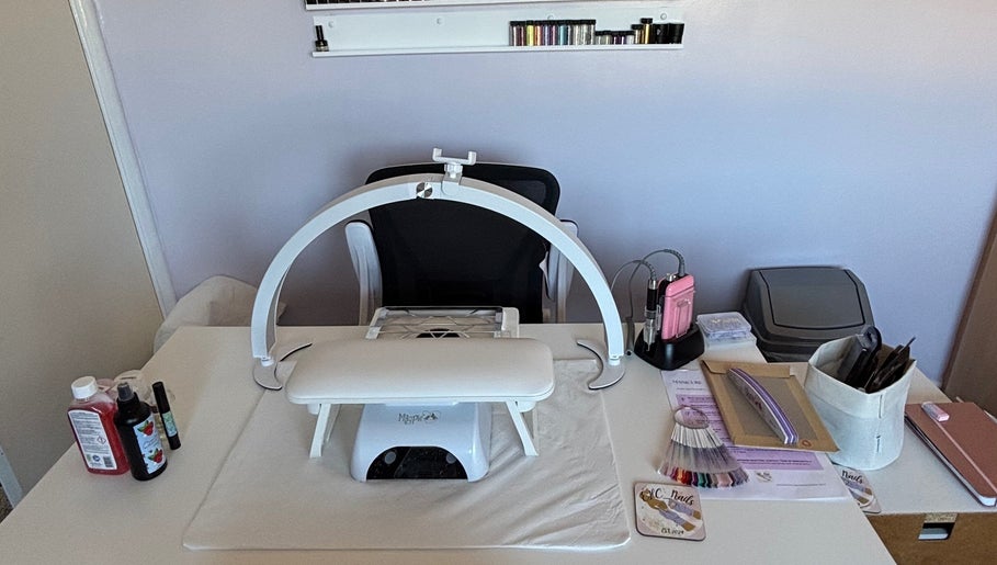 Nail work station at EHC_Nails, Leicester, England, GB, featuring tools and equipment in a modern setting.