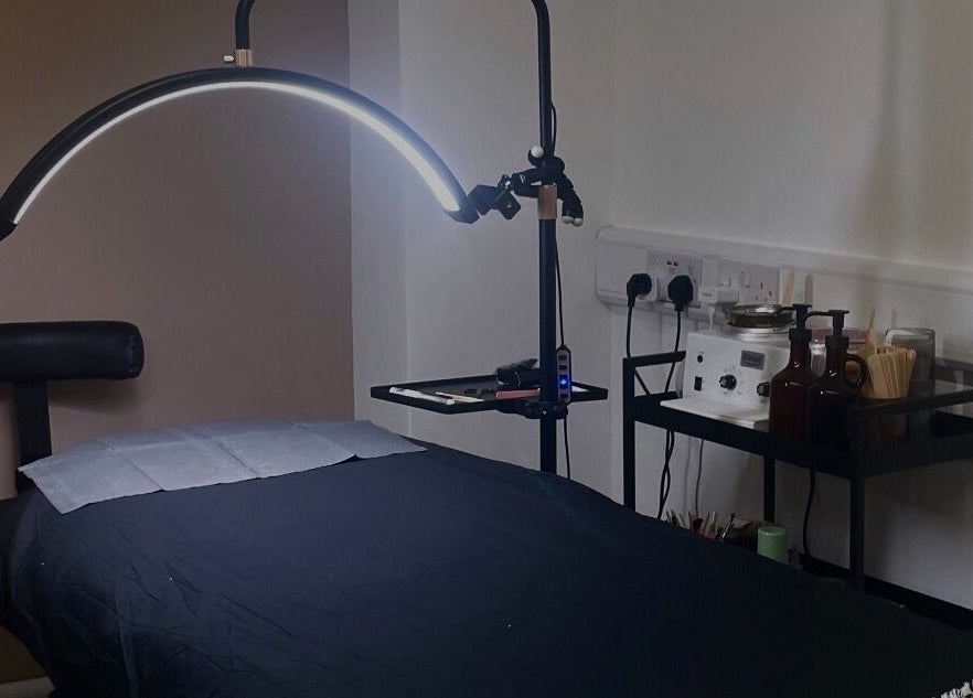 JL Beauty's serene treatment room in Pontyclun, Wales, GB, offering a peaceful ambiance for wellness.