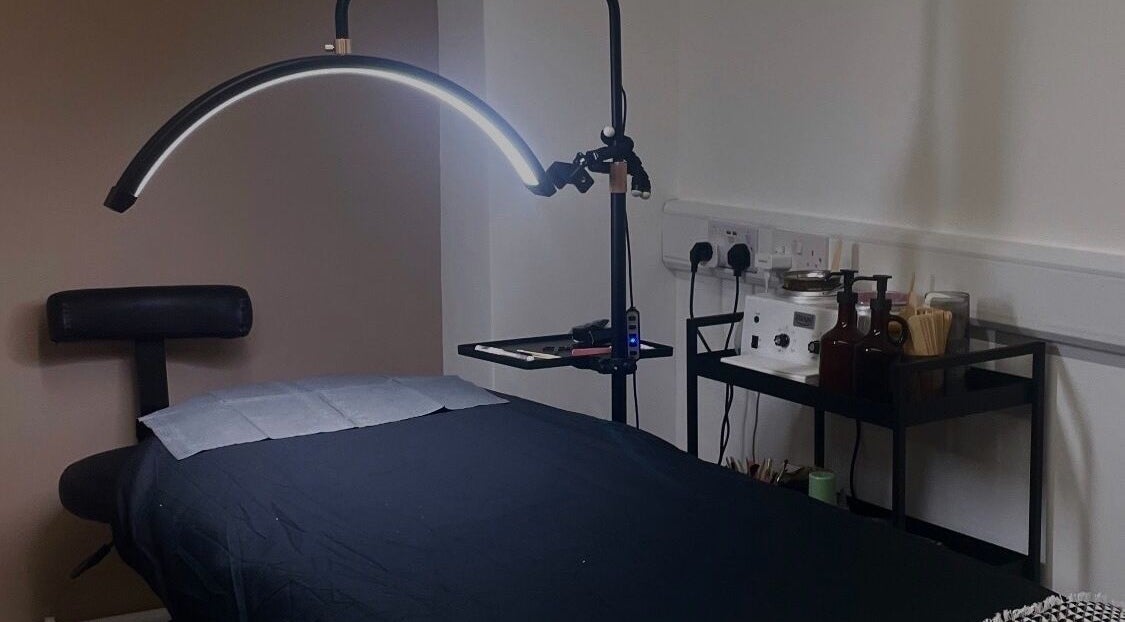 JL Beauty's serene treatment room in Pontyclun, Wales, GB, offering a peaceful ambiance for wellness.