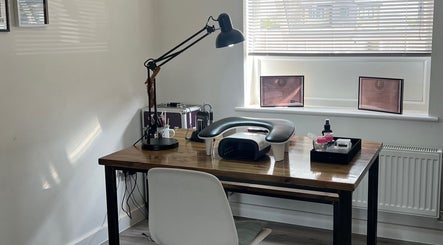 SimplynailsbyJess nail station, a modern manicure setup in Margate, England, GB with certificates displayed.