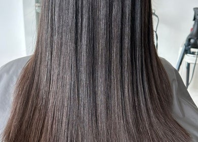 Long, straight hair styled at Nudeblush Studio in Stanwell, England, GB, showcasing professional hair care.