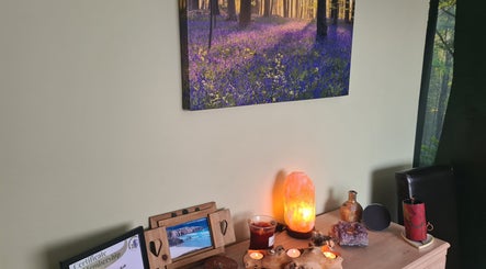 Tranquil setup with salt lamp and nature art at Offas Dyke Reflexology and holistic therapies, Trefonen, England, GB.
