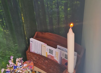 Tranquil candlelit corner at Offas Dyke Reflexology, Trefonen, England, GB.