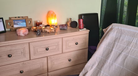 Warm, inviting therapy room at Offas Dyke Reflexology, Trefonen, England, GB.