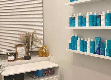 Shelf with hair care products at Deep Roots Hair Atelier, Riverhead, New York, US.