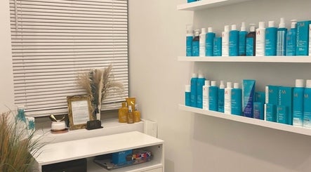 Shelf with hair care products at Deep Roots Hair Atelier, Riverhead, New York, US.
