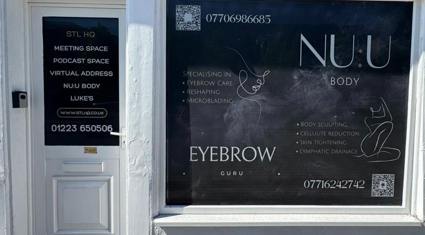 Elegant storefront of Recover with Dora in Cambridge, England, GB, showcasing beauty services and contact info.